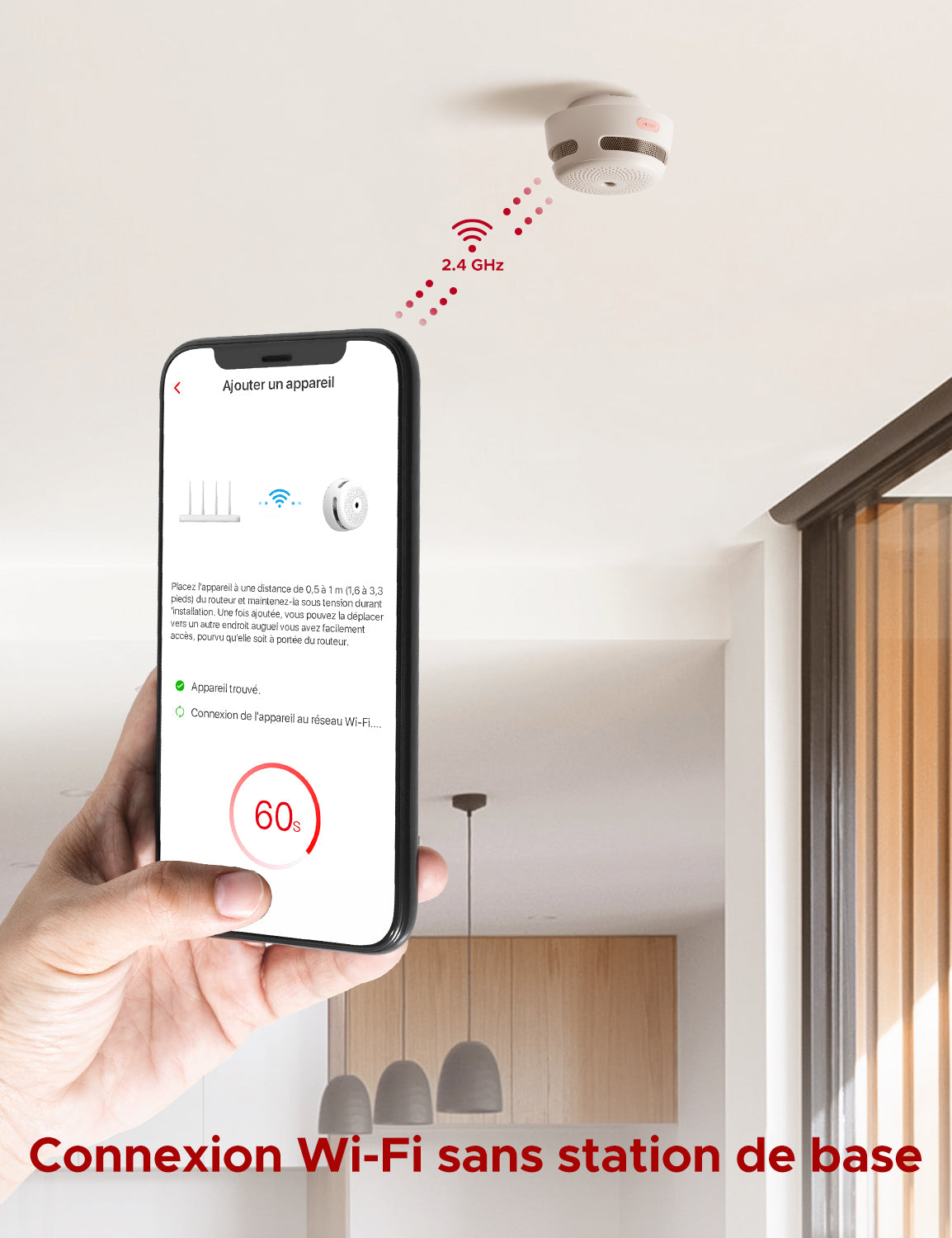 Une personne connecte le détecteur XS01-WX à l'application smartphone via Wi-Fi 2,4 GHz.